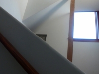 Stairwell. Plaster wood , glass.